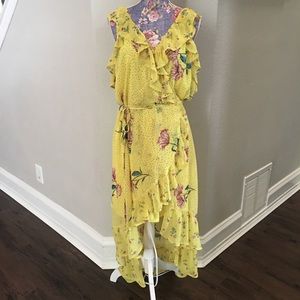 Yellow floral high-low wrap dress.